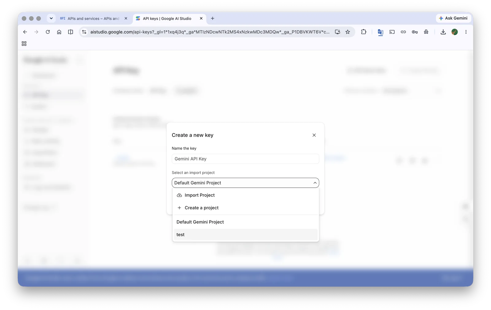 The Create a new key dialog in Google AI Studio with the project dropdown open